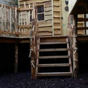 Treehouse with rubber chippings